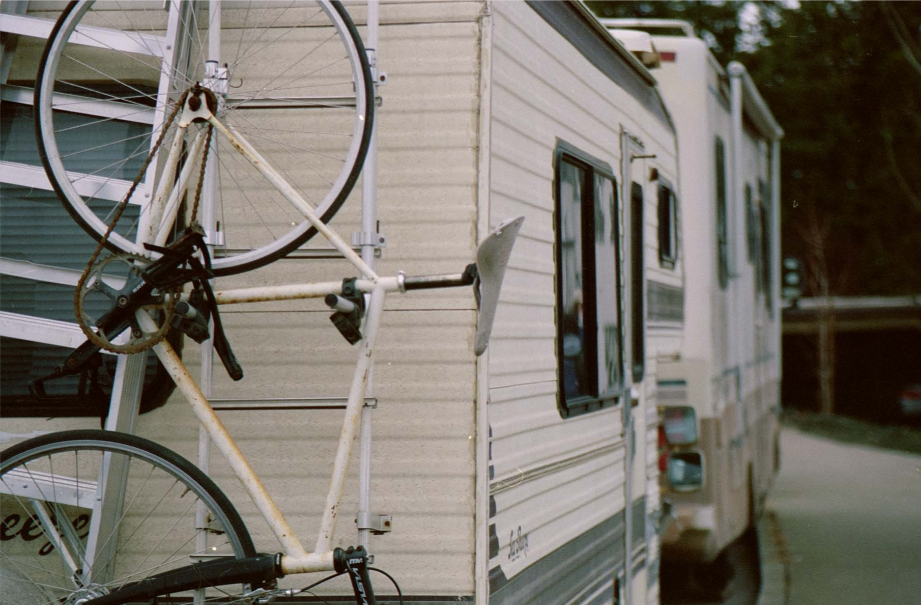 RVs parked on a flat road.