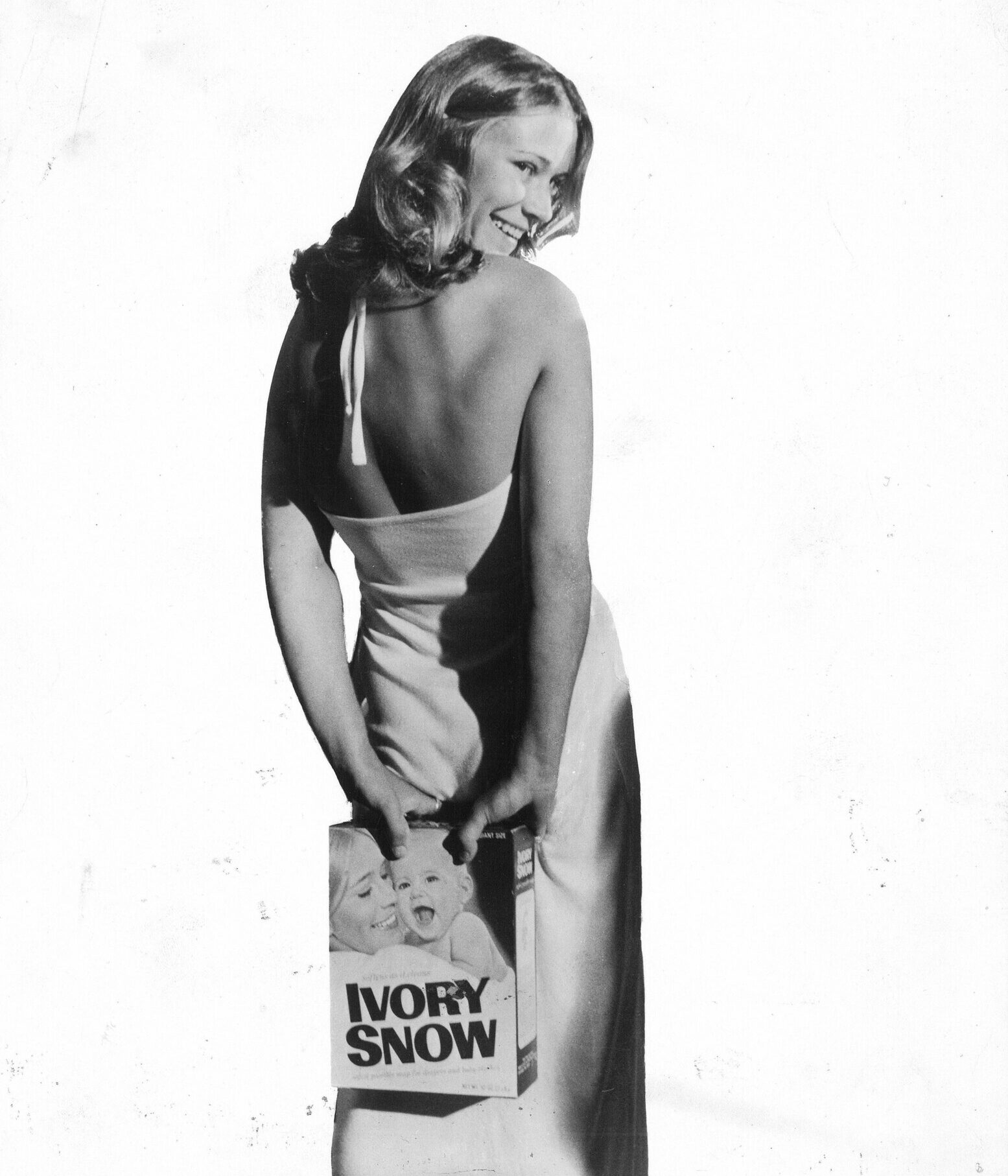 A young Marilyn Chambers poses with a box of Ivory Snow detergent.