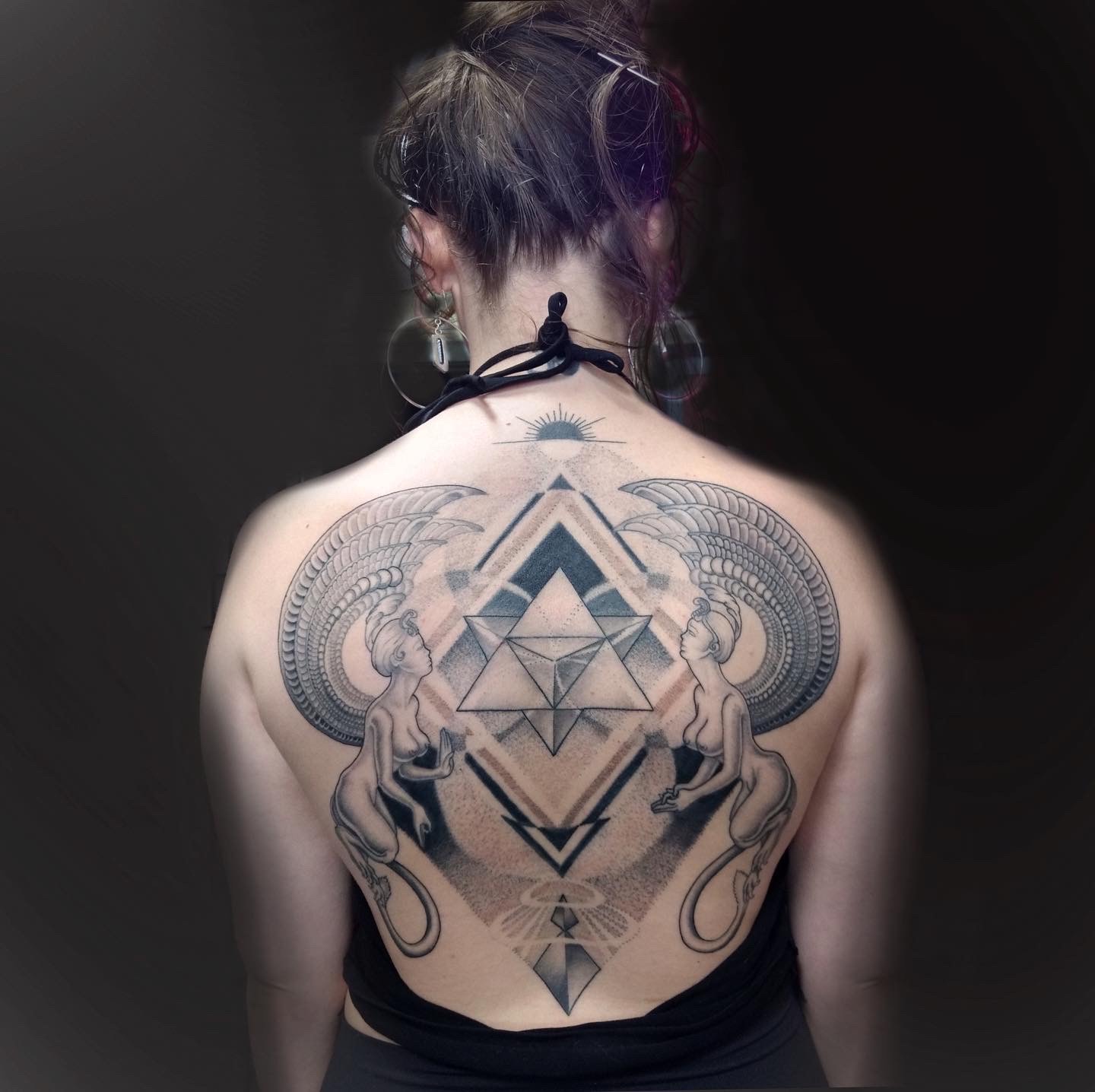 An example of Dustin Grey's tattoo work on a client's back.